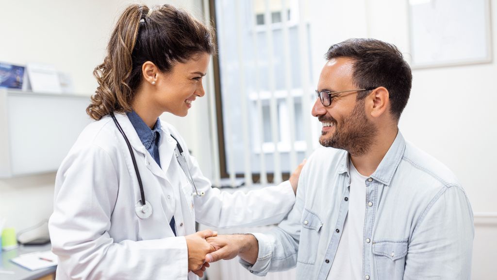 Doctor paying attention to her patient.